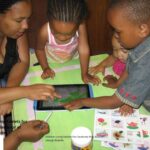 Parent and child using a tablet at home