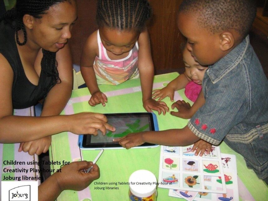 Parent and child using a tablet at home