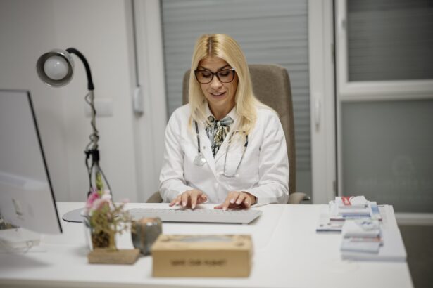 A doctor reviewing health charts with a patient
